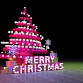 Christmas Tree Decorated With Pink White Balls Merry Christmas Sign Gift Boxes And Snowflakes