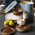 Stylish Modern Kitchenware With Jars Plates Mugs Utensils And Wooden Boards On Shelf