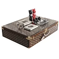 Elegant Patterned Leather Coffee Table With Glass Top Brass Accents And Decorative Figurines