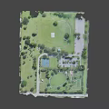Aerial View of Park with Green Grass Trees Parking Lot and Basketball Court