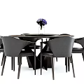 Modern Round Wooden Dining Table Set with Gray Upholstered Chairs and Purple Flower Centerpiece