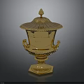 Golden Decorative Trophy With Ornate Lid Intricate Handles And Detailed Base
