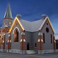 Historic Gothic Building With Spire Stone Brick Structure And Illuminated Arched Windows At Night
