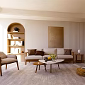 Bright Living Room Interior With Beige Sofa Armchair Coffee Table And Arched Bookshelf