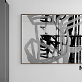 Abstract Black And White Oil Painting Hanging In Minimalist White Room With Wooden Frame