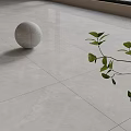 Gray Marble Sphere And Green Leaf Branch On Light Colored Tiled Floor 3d model