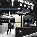 Modern Black White Exhibition Booth With HYVGEAR Brand Display Screens And Reception Counter