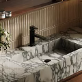 Elegant Marble Sink with Black Faucet White Flowers and Vertical Striped Tile Background