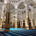 Islamic Mosque Interior With Dome Chandelier And Blue Prayer Carpet For Religious Faith