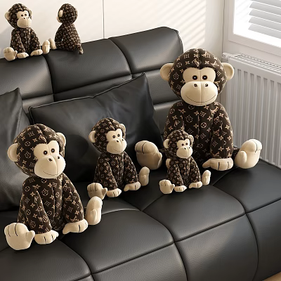 Luxury Style Monkey Plush Toys on Black Sofa 3d model