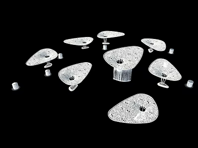 White Cone Shaped Decorative Objects With Hollow Patterns And Base Stands Against Black Background 3d model