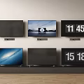 Multiple Televisions With Black Screens Displaying Scenic Views And Digital Time In Modern Room