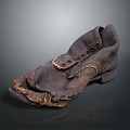 Old Worn Brown Leather Shoes With Torn Upper And Worn Sole Details