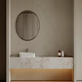 Modern Bathroom Vanity With Marble Countertop Round Mirror Toiletries And Neutral Wall