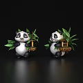 Two Cute Turtle Figurines Holding Green Leaves And Small Baskets On Black Surface