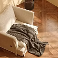 Cozy Beige Single Sofa With Light Cushion Dark Gray Knitted Blanket On Wooden Parquet Floor