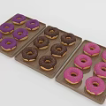 Colorful Donuts Arranged on Wooden Trays with Purple Brown and Pink Glazes