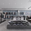 Modern Clothing Store Interior With Displayed Shirts Folded Clothes And Hanging Garments