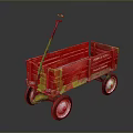 Red Metal Toy Wagon With Black Handle And White Rimmed Wheels