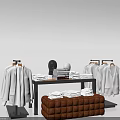 Clothing Display Shelves With Hanging White Garments Folded Clothes And Brown Padded Table