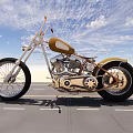 Custom Gold and Black Motorcycle on Road with Blue Sky White Clouds