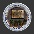 Fresh Green Herbs Garnishing Silky Tofu On Blue And White Patterned Plate With Sauce
