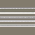 White Crown Molding With Various Designs Five Pieces Neatly Arranged On Light Brown Background