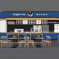 English Style Milk Tea Shop Interior With Blue White Decor Wooden Tables And Seating Area