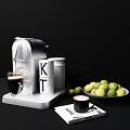 Modern Coffee Machine With Espresso Cup Bowl Of Fresh Limes And Book On Black Table