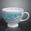 Elegant Porcelain Cup With Blue And White Floral Patterns And Decorative Rim