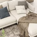 White L Shaped Sofa Coffee Table Set With Decorative Pillows Throw Blanket And Grey Rug