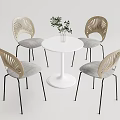 Modern Round White Table With Leaf Shaped Backrest Chairs And Potted Plant 3d model