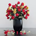 Black Vase With Red And Yellow Roses On Table With Scattered Petals
