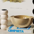 Decorative Ornament Set With White Stacked Spheres And Wooden Bowl Shaped Decor On Books