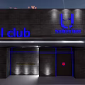 L'1 Club Bar Interior With Blue Neon Background And Bottle Shelves Bar Counter Black Stools