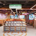 Modern Restaurant Interior With Orange Decor Plants Lighting And Seating Areas