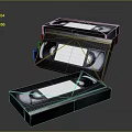 Open Black VHS Video Cassette Tapes With Plastic Cases On Dark Background