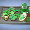 Clover Shaped Green Cookies And Cup Decorations On Festive Metal Tray