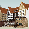 European Architecture With Red Tile Roof Clock Tower And Half Timbered Facade
