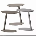 Three Modern Light Toned Side Tables With Slim Legs And Minimalist Design