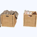 Woven Rattan Storage Baskets With Grey Cloth And Books Inside