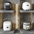 Six Modern Rice Cookers On Marble Shelves With Grey Marble Walls And Golden Lines