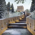 Beautiful Garden Features With Stone Steps Snowy Landscape And Illuminated Stone Walls