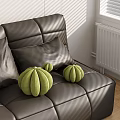 Green Pumpkin Shaped Cushions on Soft Leather Sofa in Living Room