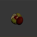 Split Chestnut Shell Revealing Red Nut And Whole Chestnut On Dark Surface