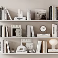 Stylish Decorative Ornaments And Books Arrangement On White Shelves With Clock Vase And Lamp