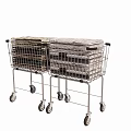 Stainless Steel Utility Carts With Stacked Folded Towels And Rolling Wheels