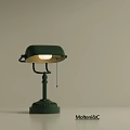 Green Table Lamp With Classic Design Illuminated Shade And Sturdy Metal Base