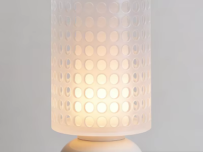 Modern White Table Lamp With Circular Perforated Shade And Warm Glow 3d model
