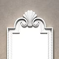 Ornate Gold Framed Decorative Wall Mounted Mirror Reflecting Modern Room Interior